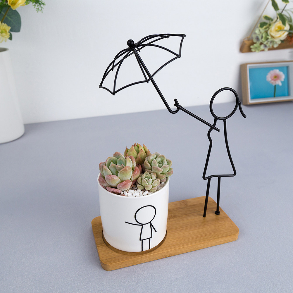 Iron Art Flower Pot Creative P - مراجعة Plant Parent Pot وسعره